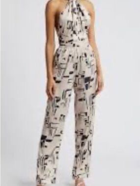 Diarrablu Cream Halter-Neck Jumpsuit with Black Graphic Motif